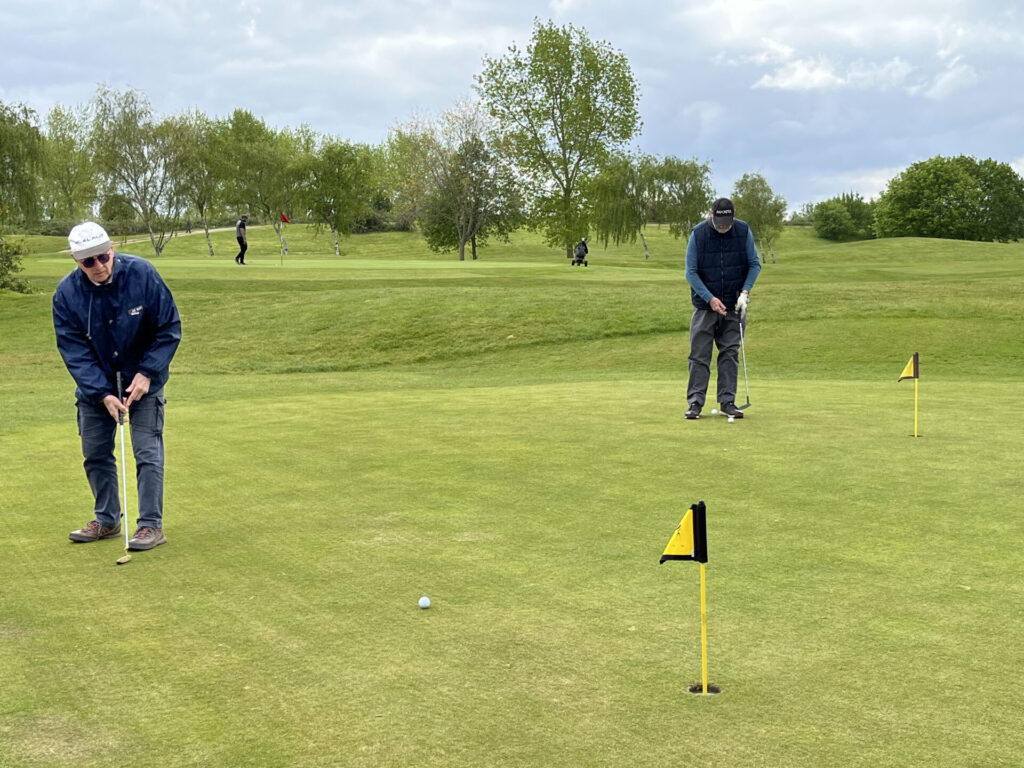 People on a golf course