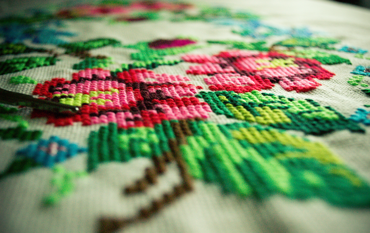 A side view of embroidered flowers